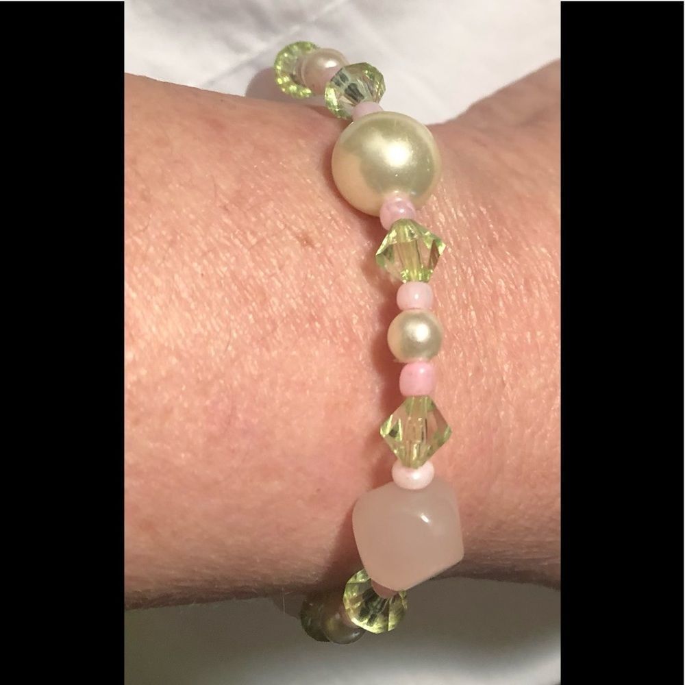 Pink, lime, white plastic bead bracelet-elastic band.
